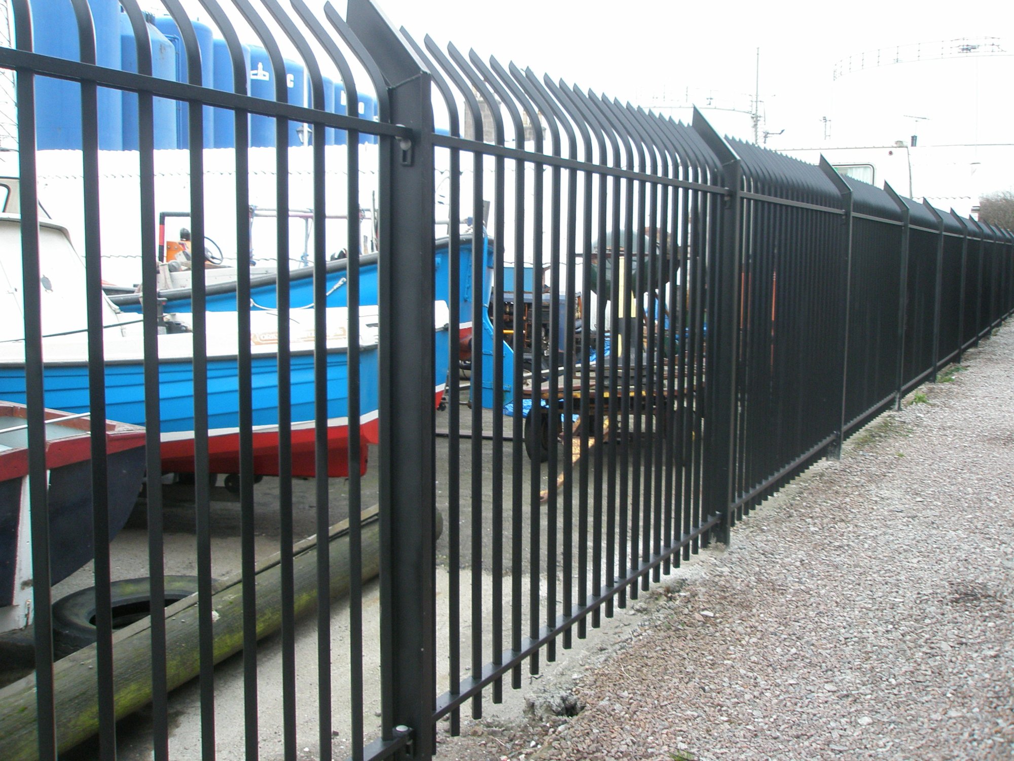 Vertical bar railings with a cranked top for enhanced security.